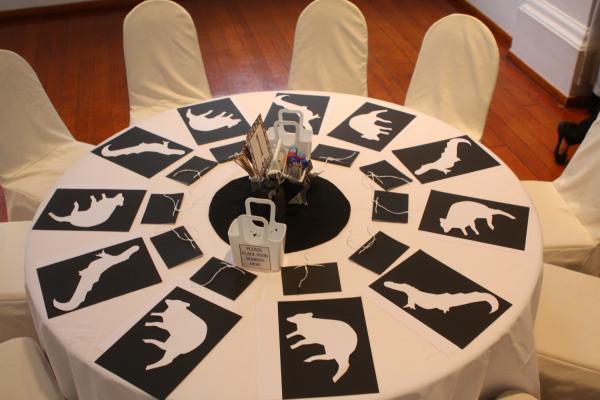 Tables prepared with silhouette templates for puppets.