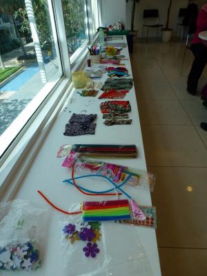 A range of craft materials laid out for the workshop